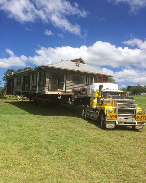 House on truck for relocation - House relocation in Sunshine Coast QLD